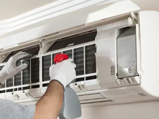 Air conditioning service work carried out during a maintenance visit
