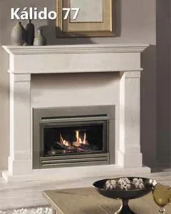 Insert gas fire fitted into a fireplace surround